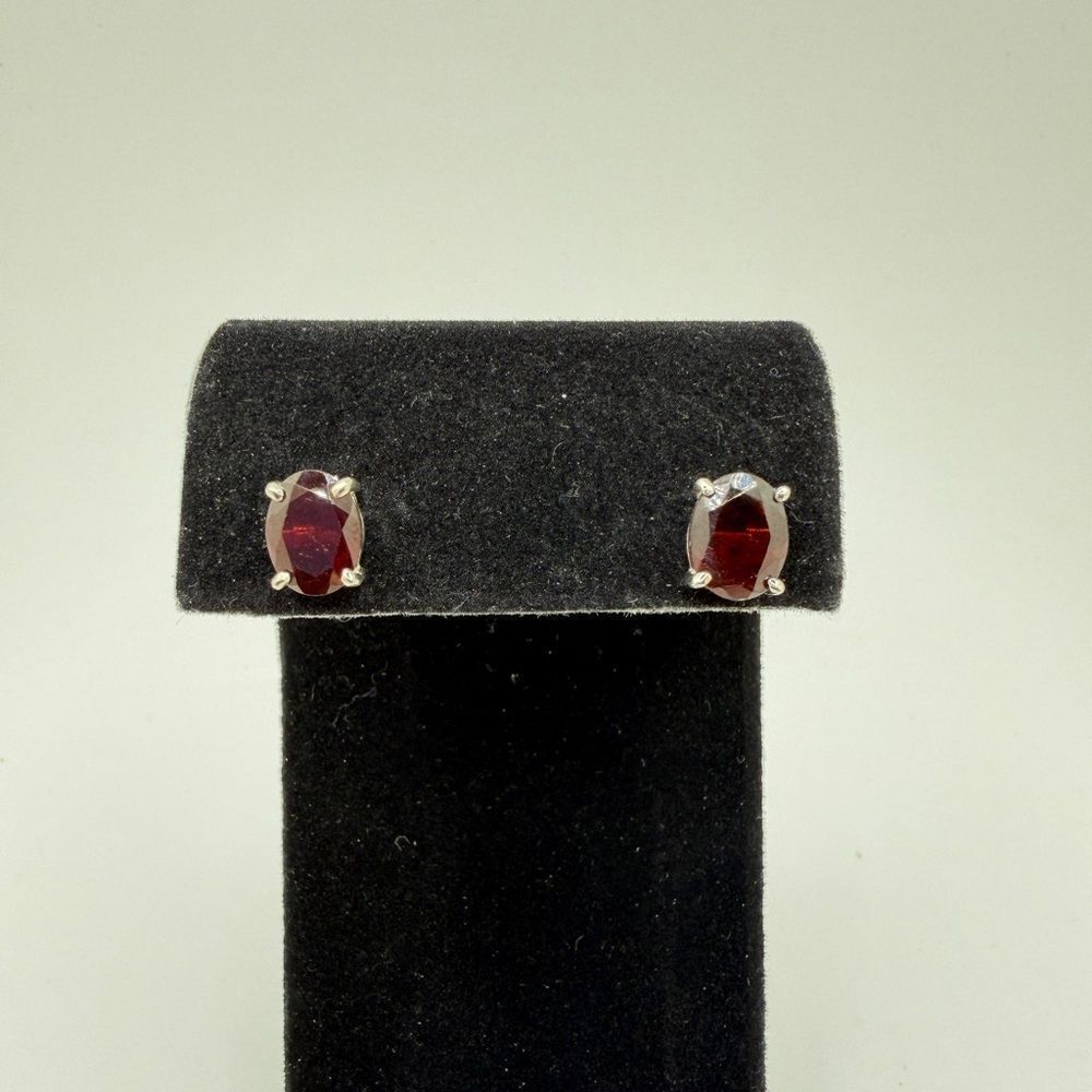NWOT 9x7 mozambique garnet, oval cut, faceted earring studs in sterling silver!